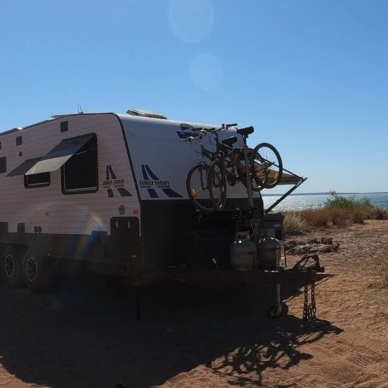 Family Escape Great Escape Caravan with bike rack on beach